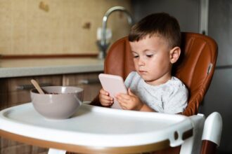 Kid watching phone